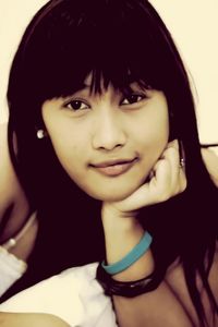 Close-up portrait of smiling girl