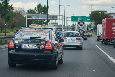 Cars moving on road in city