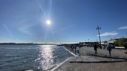 Panoramic view of sea against sky on sunny day