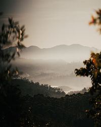 Scenic view of mountains against sky during sunset