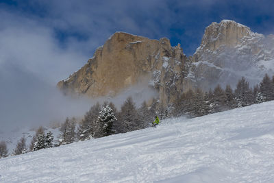 Snow covered mountain against sky