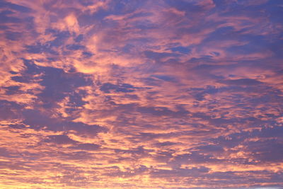 Low angle view of clouds in sky during sunset