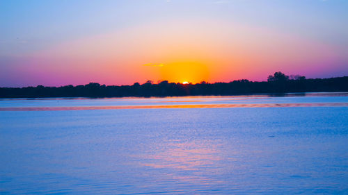 Scenic view of sunset over sea