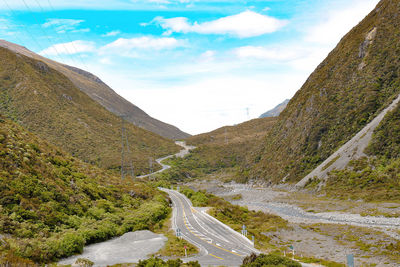 View of road in arthur pass and high mountains, south island, new zealand