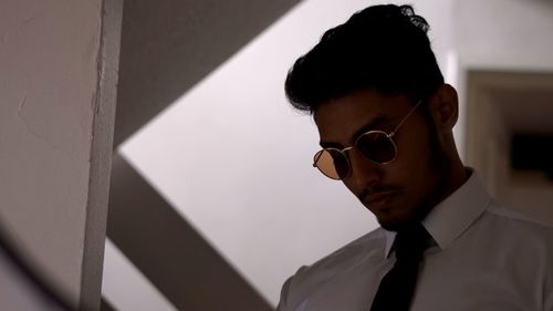 Close-up of young woman wearing sunglasses