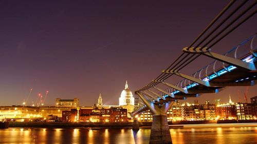 Bridge over river at night