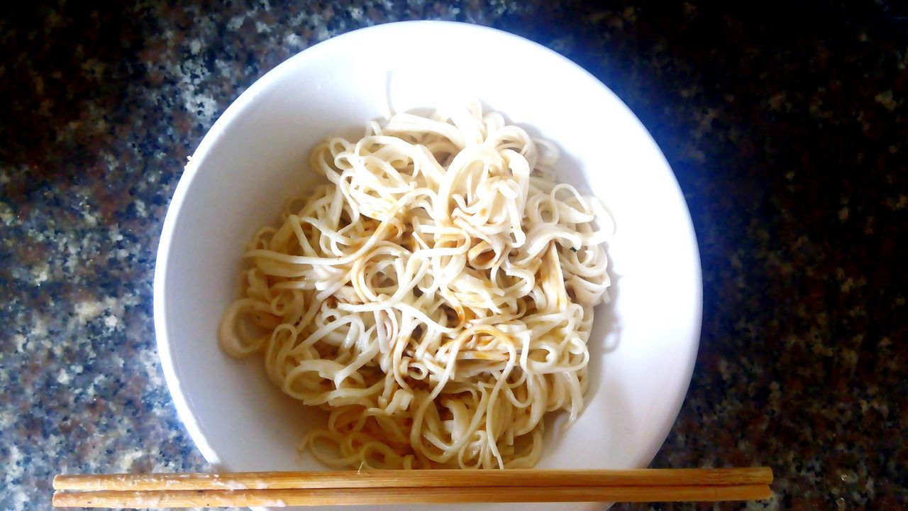 food and drink, indoors, food, healthy eating, freshness, noodles, bowl, plate, still life, ready-to-eat, pasta, close-up, table, serving size, meal, high angle view, spoon, directly above, spaghetti, no people