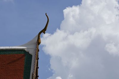 Low angle view of a sculpture against building