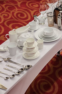 High angle view of crockery on table