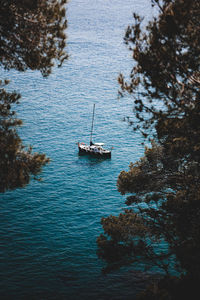 High angle view of sailboat sailing on sea