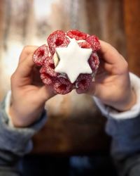 Close-up of hand holding ice cream