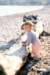 Full length of girl on rock