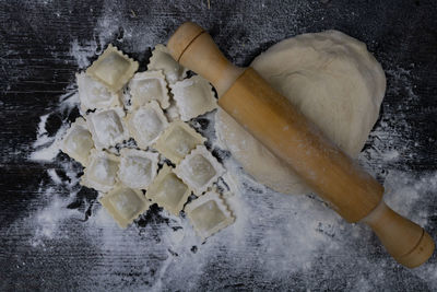 Cropped hand of person preparing food