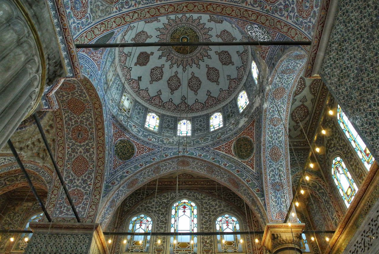 LOW ANGLE VIEW OF STAINED GLASS IN BUILDING