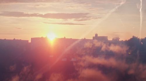 Sun shining through clouds