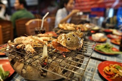 Close-up of crab in plate on table