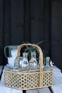 Close-up of wine bottles on table