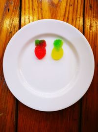 High angle view of fruits in plate on table
