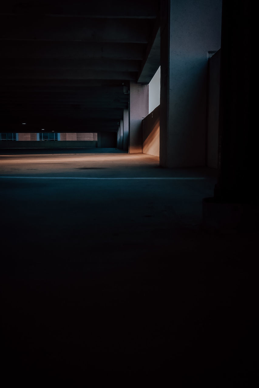 darkness, light, night, architecture, built structure, dark, illuminated, lighting, no people, indoors, city, transportation, screenshot, building, copy space, black, light - natural phenomenon, lighting equipment, long exposure