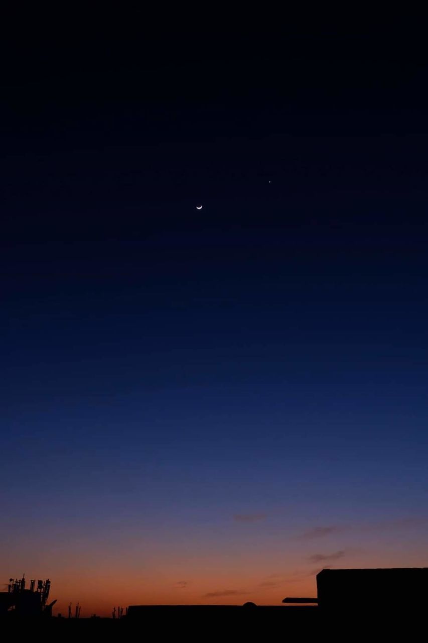 sky, night, dawn, silhouette, moon, horizon, scenics - nature, no people, nature, beauty in nature, architecture, tranquility, astronomical object, tranquil scene, sunset, built structure, building exterior, space, afterglow, evening, copy space, cloud, outdoors, astronomy, blue, star, building, landscape, idyllic, dark