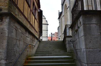 Staircase amidst buildings