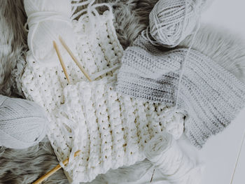 High angle view of woolen knitted sweater on table