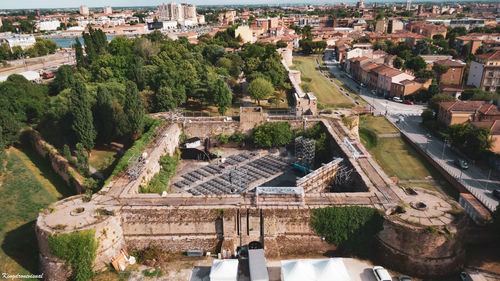 High angle view of river amidst buildings in city