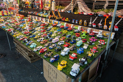 High angle view of multi colored for sale at market stall