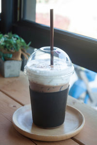 Close-up of coffee cup on table