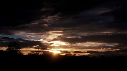 Scenic view of dramatic sky during sunset