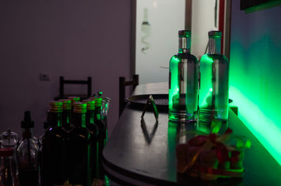 Vodka bottles on table at restaurant