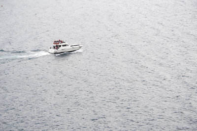 High angle view of boat sailing on sea