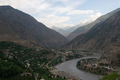 High angle view of road amidst mountains against sky