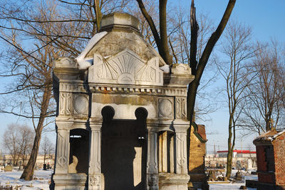 Low angle view of cemetery against sky