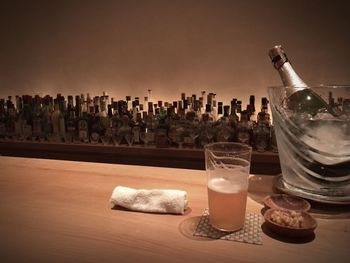 Wine bottles on table