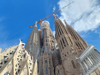 Low angle view of building against blue sky