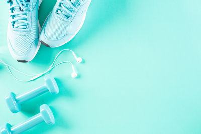 High angle view of blue shoes on table