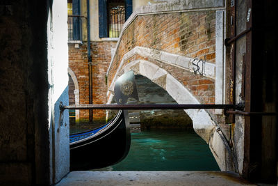 View of canal seen through boat window