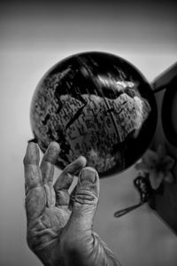 Close-up of hand holding ball