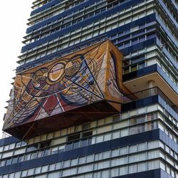 Low angle view of clock on building