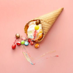 Ice cream cone on colored background