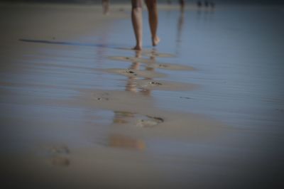 Reflection of woman in water