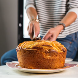 Midsection of woman having food