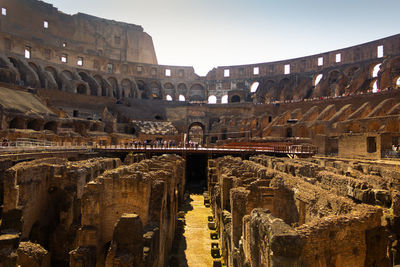 The colosseum, an oval amphitheater in the center of the city of rome, italy.