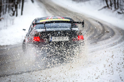 View of car on road in winter