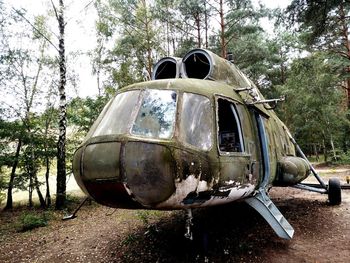 Abandoned vehicle in forest