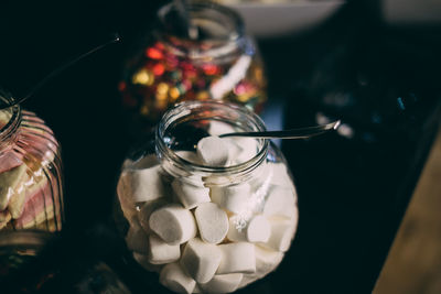 Close-up of glass jar on table