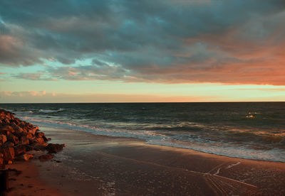 Scenic view of sea against sky during sunset