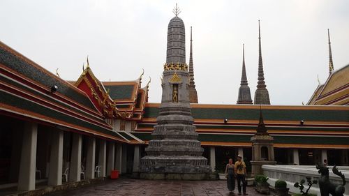 Tourists in front of historic building