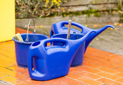 High angle view of blue container on floor